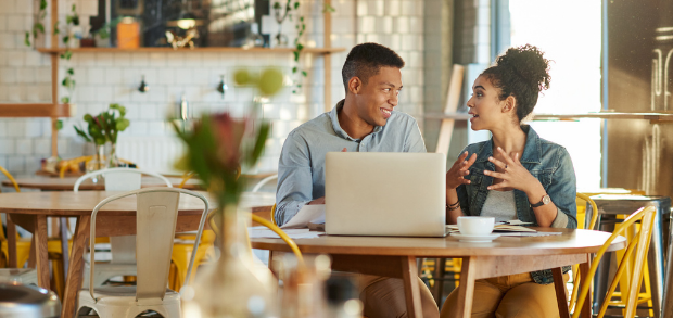 cafe owners discussing their restaurant marketing ideas