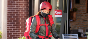 Grubhub delivery driver completing a contact-free delivery order